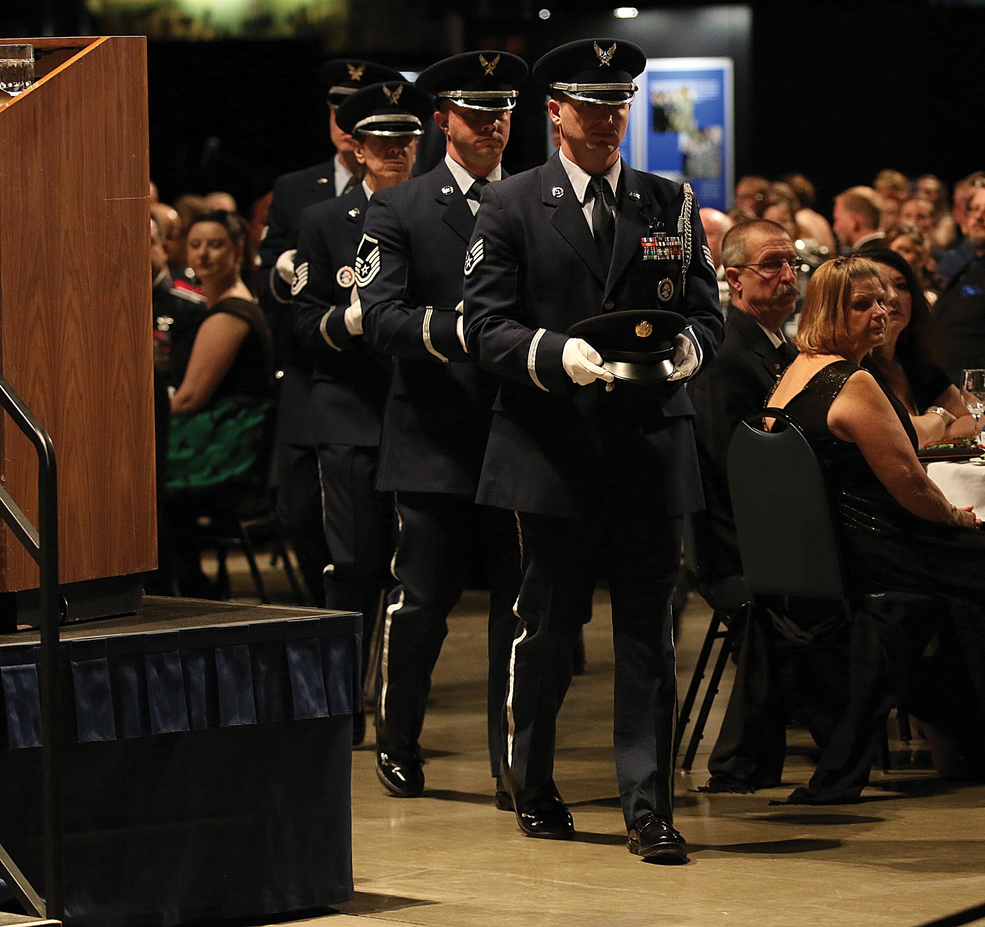 The 445th Airlift Wing Honor Guard performs a solemn POW/MIA table ceremony during the 445th AW annual awards banquet April 7, 2018.