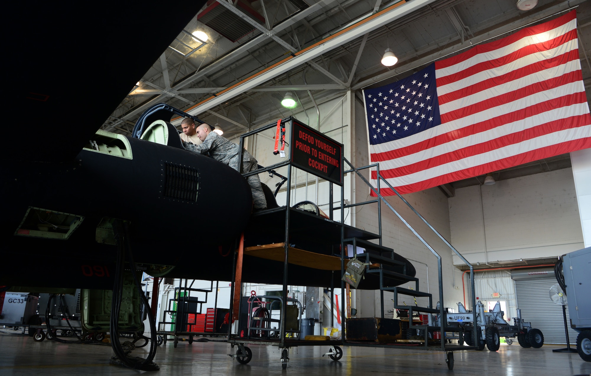Staff Sgt. Terrance Walker and Tech. Sgt. Stephen Bartorillo, 9th Maintenance Squadron repair and reclamation craftsmen, perform phase maintenance on a U-2 Dragon Lady