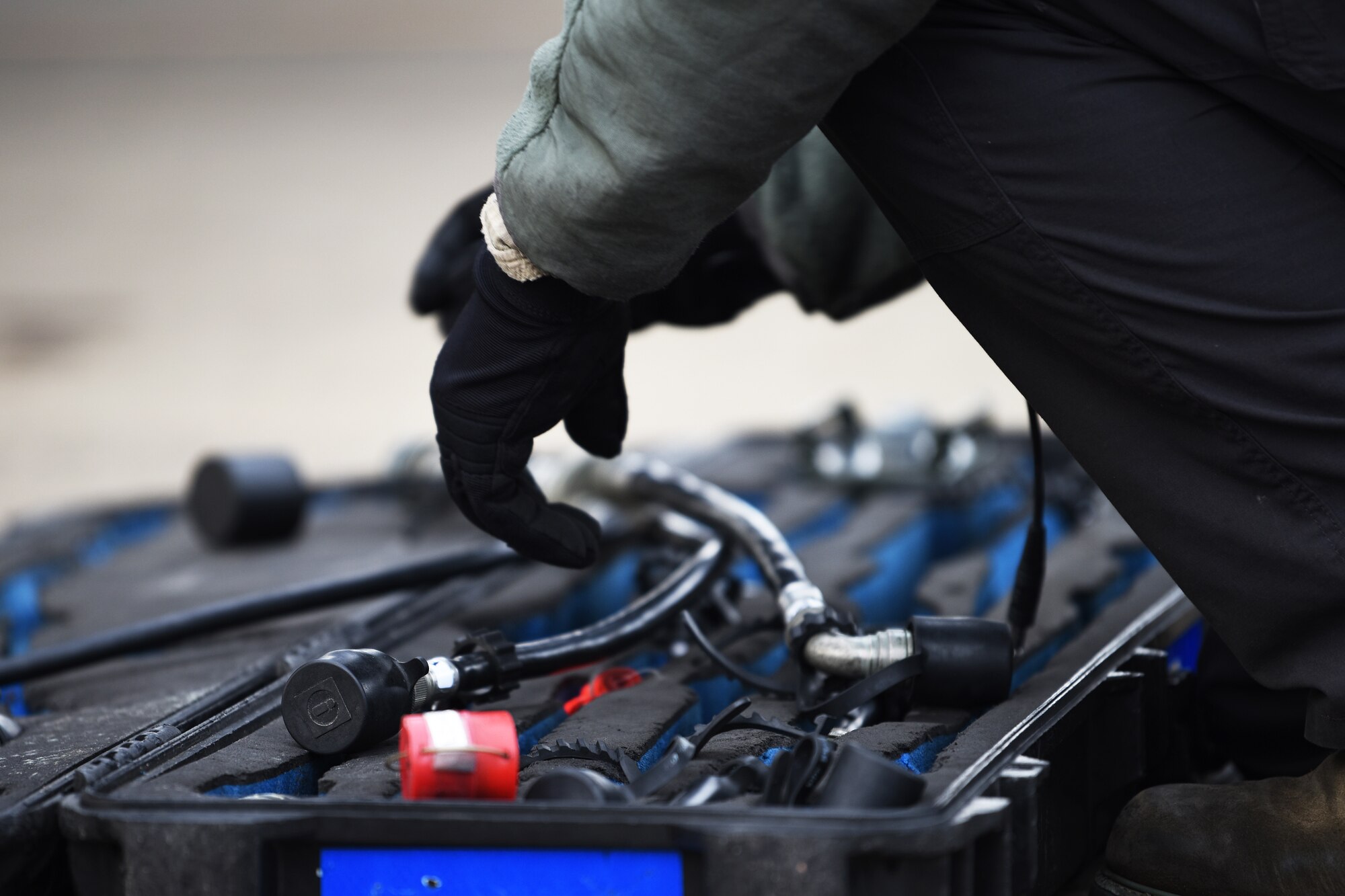 A 492nd Aircraft Maintenance Unit Airman replace aircraft weapons maintenance tools at Royal Air Force Lakenheath, England, Jan. 7, 2019. Aircraft maintenance personnel must maintain complete accountability of tools in accordance with equipment control policies and foreign object damage prevention. (U.S. Air Force photo by Airman 1st Class Shanice Williams-Jones)