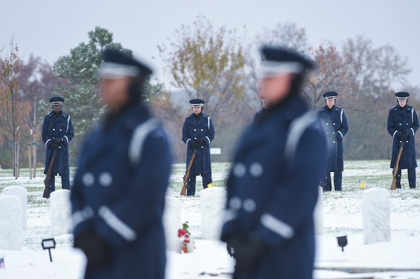 The U.S. Air Force firing party stand watch as Chief Master Sgt. Therese Henrion is laid to rest at Arlington National Cemetery, Nov. 15, 2018.