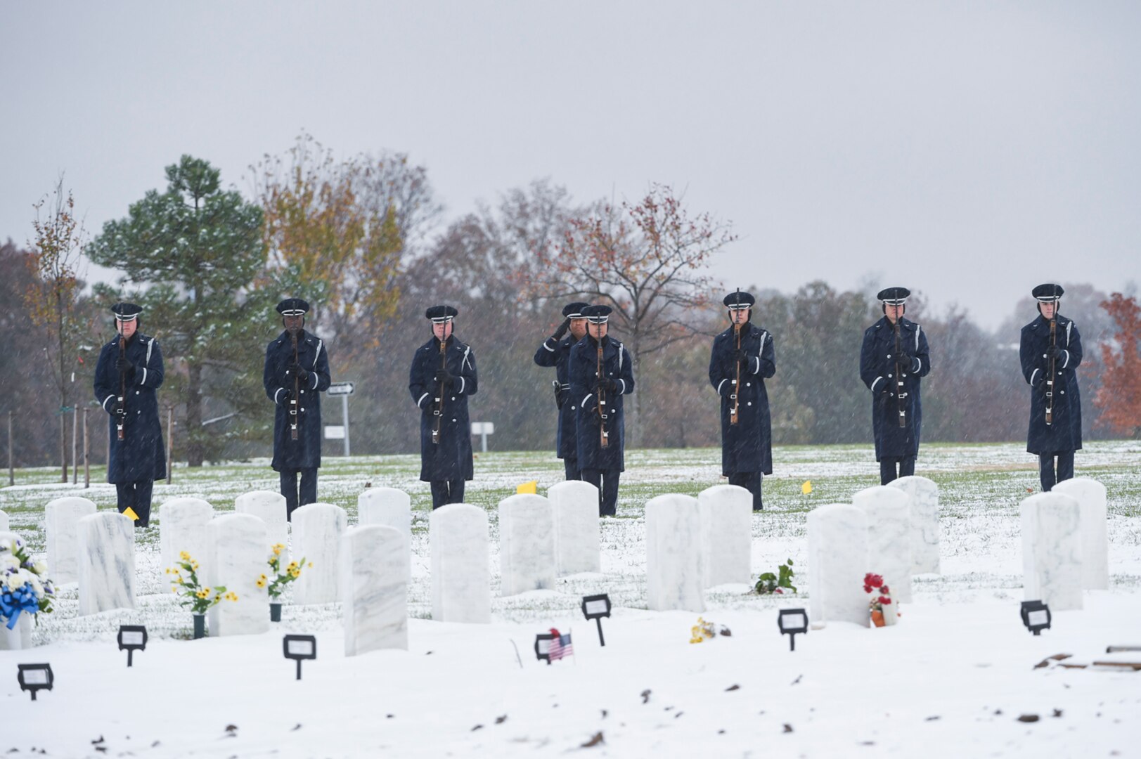 The U.S Air Force firing party perform a rifle salute in honor of the late Chief Master Sgt. Therese Henrion during an interment at Arlington National Cemetery, Nov. 15, 2018.