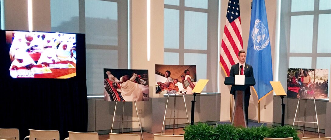 Large photos of children, printed at the DLA Executive Print Facility, surround the lectern where the first lady gave a speech supporting the Be Best campaign.