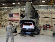U.S. military members and DoD civilians of the Joint Task Force Civil Support (JTF-CS) participated in a concept loadout exercise at Felker Army Airfield, Fort Eustis, Va., Dec. 21, 2018. JTF-CS members participated in the scenario event with 11th Theater Aviation Command (TAC), U.S. Army General Support Aviation Battalion (5-159th), Army aviation coordination team based at Fort Eustis. “Through concept development JTF-CS rapid deployability can be enhanced by using small, independent teams,” said Kevin Woodrum, a joint exercise planner. “These teams utilize the joint planning process (JPP) to conduct detailed planning to save lives, mitigate the effects of the CBRN incident and provide situational understanding while coordinating with local, state, tribal and federal officials to determine the level of DoD support required.” (Official DoD photo by Air Force Tech. Sgt. Michael Campbell/released)