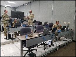 FORT KNOX, Ky. Soldiers from the Casualty Operations Division from the 14th Human Resources Sustainment Center (HRSC) reviews the casualty reporting flow. The 14th Human Resources Sustainment Center conducted a staff exchange (STAFFEX) at the Fort Knox Mission Control Training Center (MCTC) Dec 10-14.