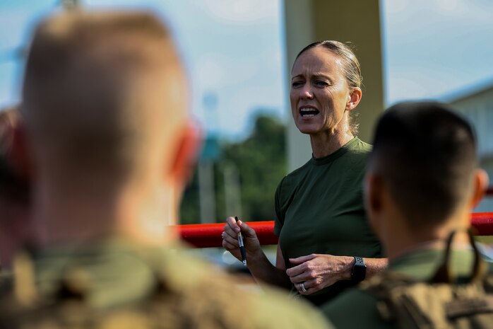 Col. Maura M. Hennigan addresses the Marines and Sailors of Combat Logistics Regiment 3, 3rd Marine Logistics Group, at the conclusion of Back in the Saddle (BITS) training Jan. 4, 2019 at Camp Foster, Okinawa, Japan. CLR-3 conducted the BITS training in order to maintain personnel readiness and keep Marines and Sailors prepared to deploy at a moment’s notice. Hennigan, a native of Sayville, New York, is the commanding officer of CLR-3, 3rd MLG. (U.S. Marine Corps photo by Lance Cpl. Armando Elizalde)