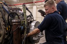 Lance Cpl. Connor D. Kretchman removes an oil cooler hose from an Amphibious Assault Vehicle transmission Jan. 8, 2019 at Camp Kinser, Okinawa, Japan. Marines with Component Repair Platoon, General Support Maintenance Company, 3rd Maintenance Battalion, Combat Logistics Regiment 35, 3rd Marine Logistics Group, clean, rebuild and repair parts of motor vehicles to ensure that they are serviceable. Kretchman, a native of Muskego, Wisconsin, is an AAV technician with CRP, GSM Co., 3rd Maint. Bn., CLR-35, 3rd MLG. (U.S. Marine Corps photo by Lance Cpl. Armando Elizalde)