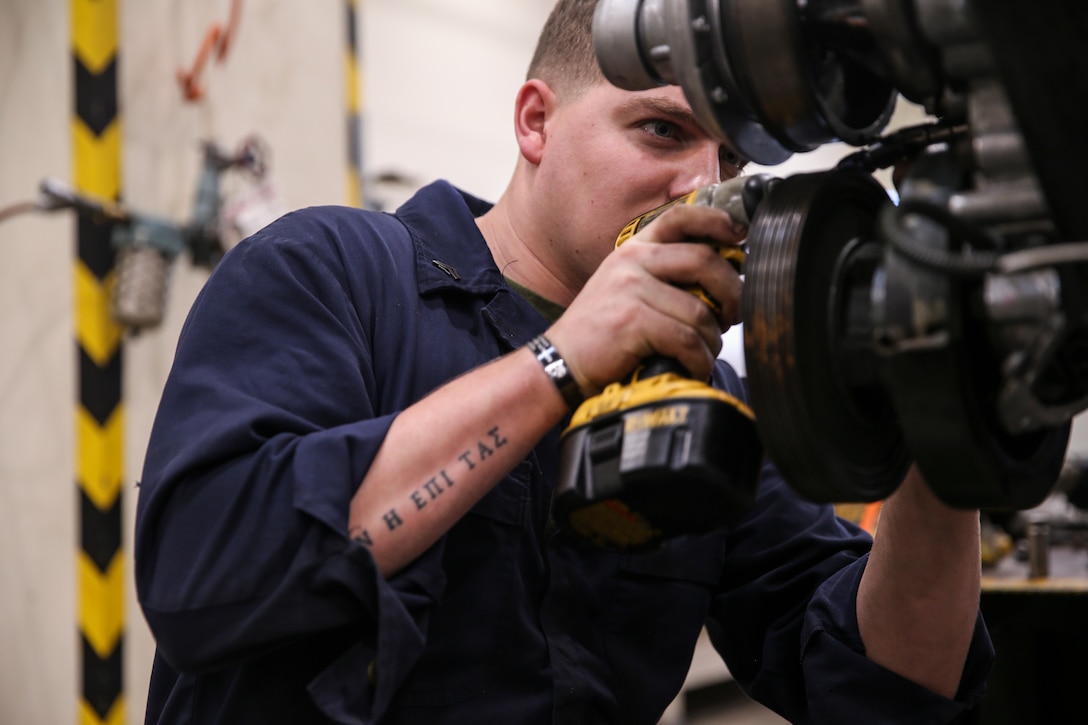 Cpl. Luigi F. Lorusso unscrews a bolt from a Humvee engine Jan. 8, 2019 at Camp Kinser, Okinawa, Japan. Marines with Component Repair Platoon, General Support Maintenance Company, 3rd Maintenance Battalion, Combat Logistics Regiment 35, 3rd Marine Logistics Group, clean, rebuild and repair parts of motor vehicles to ensure that they are serviceable. Lorusso, a native of Shoemakersville, Pennsylvania, is a motor transportation mechanic with CRP, GSM Co., 3rd Maint. Bn., CLR-35, 3rd MLG. (U.S. Marine Corps photo by Lance Cpl. Armando Elizalde)