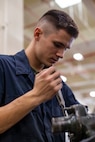 Lance Cpl. Mitchell Wiesmore tightens a bolt on a Humvee engine Jan. 8, 2019, at Camp Kinser, Okinawa, Japan. Marines with Component Repair Platoon, General Support Maintenance Company, 3rd Maintenance Battalion, Combat Logistics Regiment 35, 3rd Marine Logistics Group, clean, rebuild and repair parts of motor vehicles to ensure that they are serviceable. Weismore, a native of Duluth, Georgia, is a tank mechanic with CRP, GSM Co., 3rd Maint. Bn., CLR-35, 3rd MLG. (U.S. Marine Corps photo by Lance Cpl. Terry Wong)