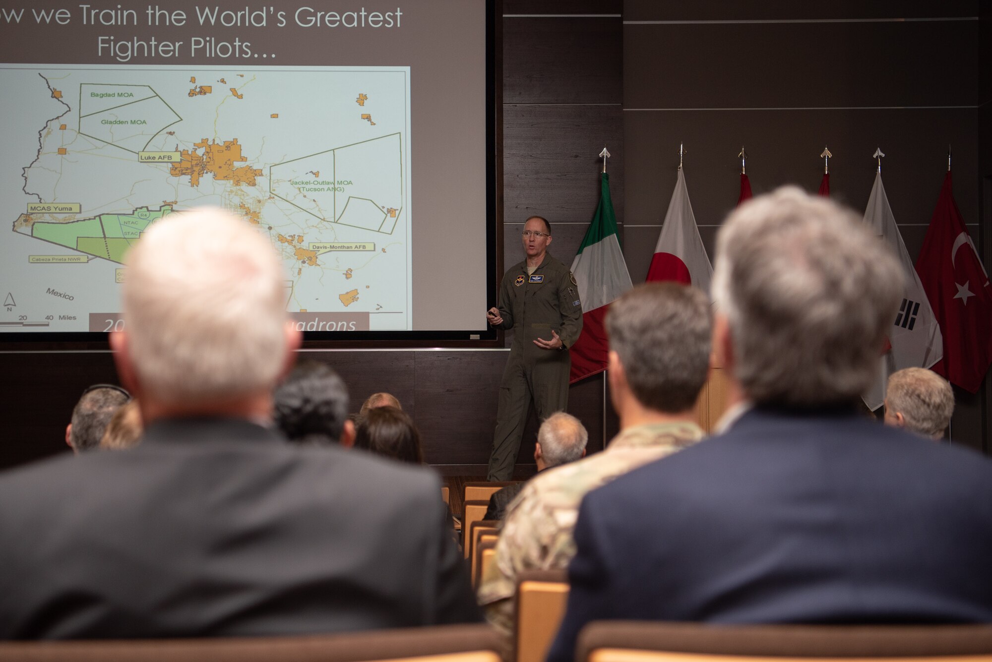 Brig. Gen Todd Canterbury, 56th Fighter Wing Commander, provides a wing mission brief to the Honorary Commanders at Luke Air Force Base, Ariz., Jan. 8, 2019.