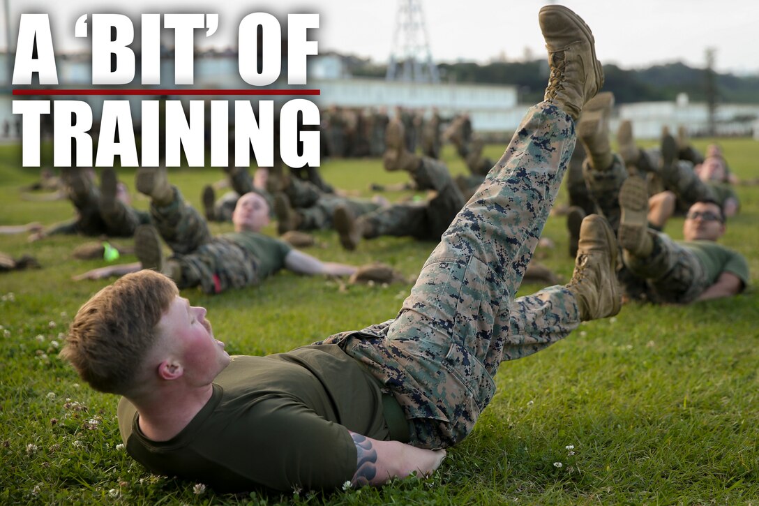 Sgt. Brandon A. Gaddy leads exercises with Marines and Sailors of Combat Logistics Regiment 3, 3rd Marine Logistics Group, during Back in the Saddle (BITS) training Jan. 4, 2019 at Camp Foster, Okinawa, Japan. CLR-3 integrated physical training with BITS training in order to create an interactive learning experience. Gaddy, a native of Fayetteville, Arkansas, is a force fitness instructor with the Correctional Custody Unit, Headquarters and Support Battalion, Marine Corps Base Camp Smedley D. Butler. (U.S. Marine Corps photo by Lance Cpl. Armando Elizalde)