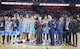 Tech. Sgt Anthony J. McCourt Jr., a recruiter from Westover Air Reserve Base, Massachusetts, presents the Rhode Island Rams with the championship trophy at the Air Force Reserve Men's Holiday Showcase at the Mohgan Sun Arena in Connecticut (Courtesy photo)