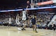 Michigan's Ignas Brazdeikis drives through the lane during the championship game against Providence in the Air Force Reserve Tip-Off Tournament at the Mohegan Sun Arena, Connecticut. The game was nationally televised on ESPN and featured prominant Air Force Reserve branding at the arena and on television. (Air Force photo/Master Sgt. Chance Babin)