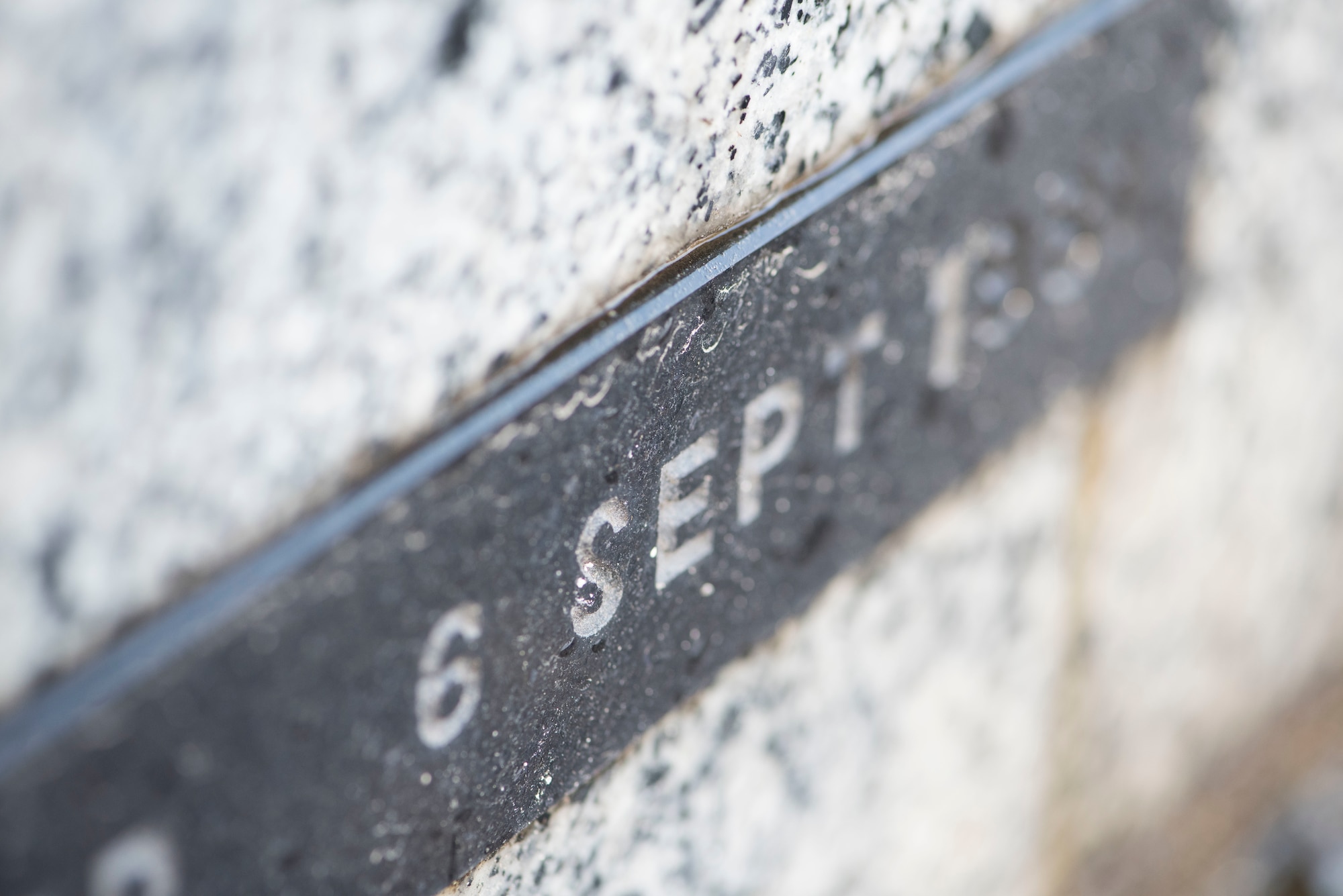 A dedication date displays on the F-86F Sabre plaque at Misawa Air Base, Japan, Dec. 18, 2018. The Japan Air Self-Defense Force and U.S. Air Force dedicated an F-86F in Risner Circle, Sept. 6, 1981, as a symbol of friendship between the two nations. Hamamatsu AB, Japan, service members disassembled the aircraft and reconstructed it at Misawa AB. (U.S. Air Force photo by Senior Airman Sadie Colbert)