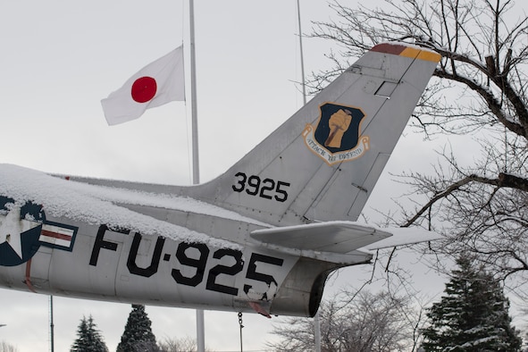 An F-86F Sabre displays both 13th and 14th Fighter Squadron colors on its tail as it sits in Risner Circle at Misawa Air Base, Japan, Dec. 18, 2018. By mid-1953, Fifth Air Force described the aircraft as the most-suitable fighter-bomber during the Korean War. The aircraft didn’t have operating problems and was noted for its stability at high altitudes. The aircraft remains emblazoned today with both 3rd Air Wing and 35th Fighter Wing shields, symbolizing the U.S.-Japan alliance. (U.S. Air Force photo)