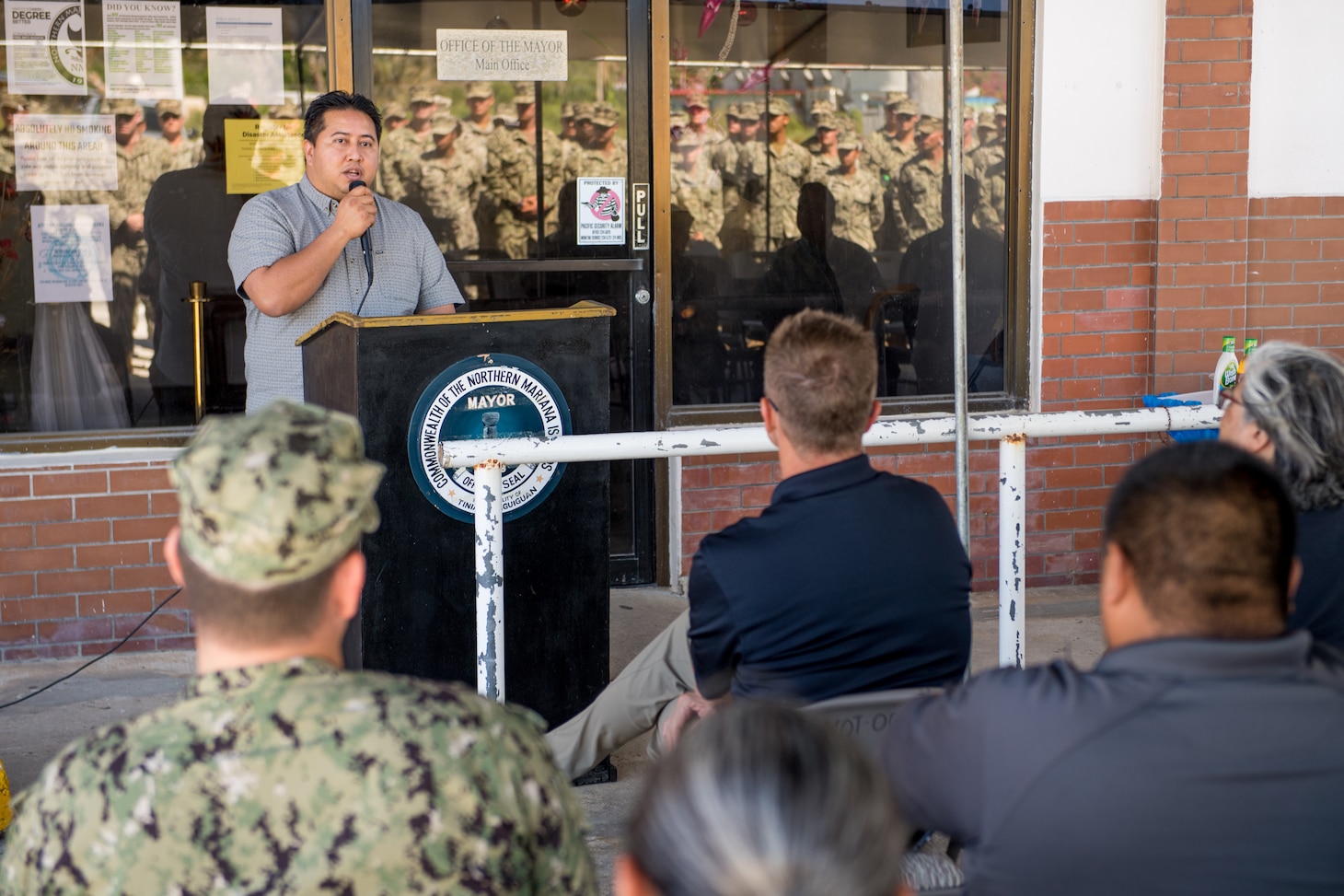 TINIAN, Commonwealth of the Northern Mariana Islands (Jan. 9, 2019) Ralph Torres, governor of the CNMI, addresses attendees during a relief-in-place and transfer of authority ceremony. Naval Mobile Construction Battalion 3, Detachment Tinian, assumed responsibility as command element for Joint Task Group Engineer from Naval Mobile Construction Battalion 1, Detachment Guam. Service members from Joint Region Marianas and U.S. Indo-Pacific Command are providing Department of Defense support to the Commonwealth of the Northern Mariana Islands' civil and local officials as part of the Federal Emergency Management Agency-supported Super Typhoon Yutu recovery efforts. (U.S. Navy photo by Mass Communication Specialist 2nd Class Kelsey J. Hockenberger)