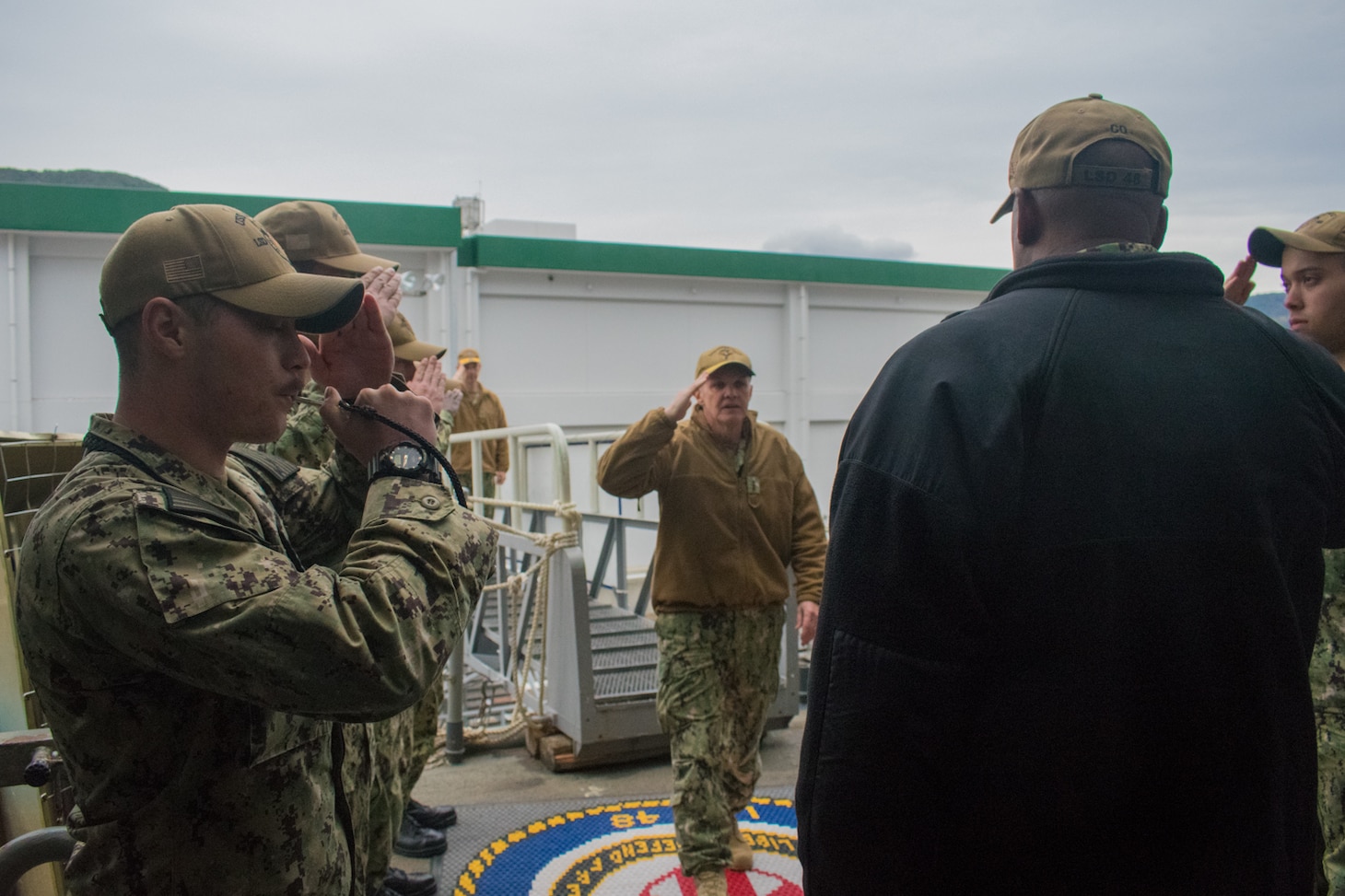 SASEBO, Japan (Jan. 9, 2019) Vice Adm. Phil Sawyer, the U.S. 7th Fleet commander, is saluted by sideboys and Cmdr. Patrick German, commanding officer of the amphibious dock landing ship USS Ashland (LSD 48), during a waterfront visit to forward deployed naval forces operating out of Fleet Activities Sasebo, Japan.
