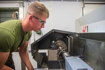 Lance Cpl. Chase Ramsby sizes a bolt Jan. 9, 2019 at Camp Kinser, Okinawa, Japan. Machinists and welders with General Support Maintenance Company, 3rd Maintenance Battalion, Combat Logistics Regiment 35, 3rd Marine Logistics Group fabricate, modify and repair parts for vehicles, weapons and other accessories. Ramsby is a machinist with GSM Co., 3rd Maint. Bn., CLR-35, 3rd MLG. Ramsby is a native of Cheboygan, Michigan. (U.S. Marine Corps photo by Lance Cpl. Terry Wong)