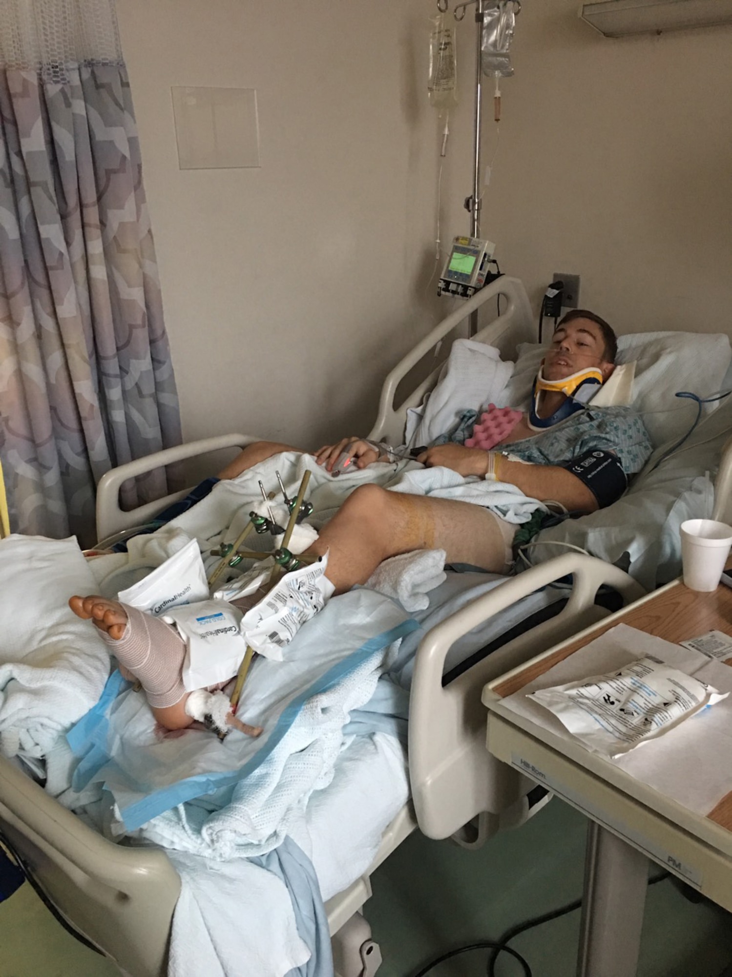 Staff Sgt. Kyle Johnson, a photojournalist with the 374th Airlift Wing Public Affairs office, wakes up from surgery on his tiba and fibula, October 5, 2018. Johnson spent a month and a half in the hospital after a scooter accident. (U.S. Air Force photo by John Souza)