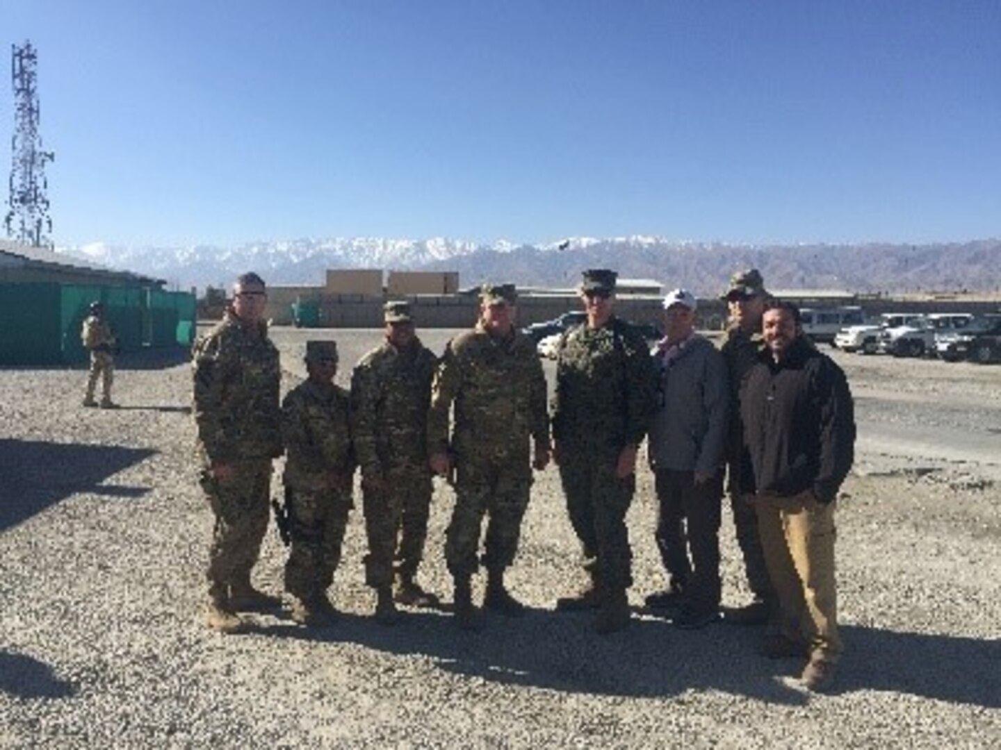 Roberto Santana Irizarry, far right, contracting officer representative, DLA Troop Support Subsistence supply chain, accompanies Army Brig. Gen. Mark Simerly, center, DLA Troop commander and his military staff during a visit to the ANHAM Warehouse in Afghanistan, January 2018. Santana Irizarry was awarded the DLA Troop Support Leader of the Year for his support to the warfighter in Afghanistan.