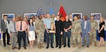 Participants who helped DLA win the 2018 Commander’s Cup pose with DLA Director Army Lt. Gen. Darrell Williams (front row, fourth from left) and Navy Command Master Chief Shaun Brahmsteadt (front row, sixth from left), DLA senior enlisted leader. Holding the trophy is Andy Green of DLA Strategic Materials, who organized DLA’s participation in the events throughout the year.