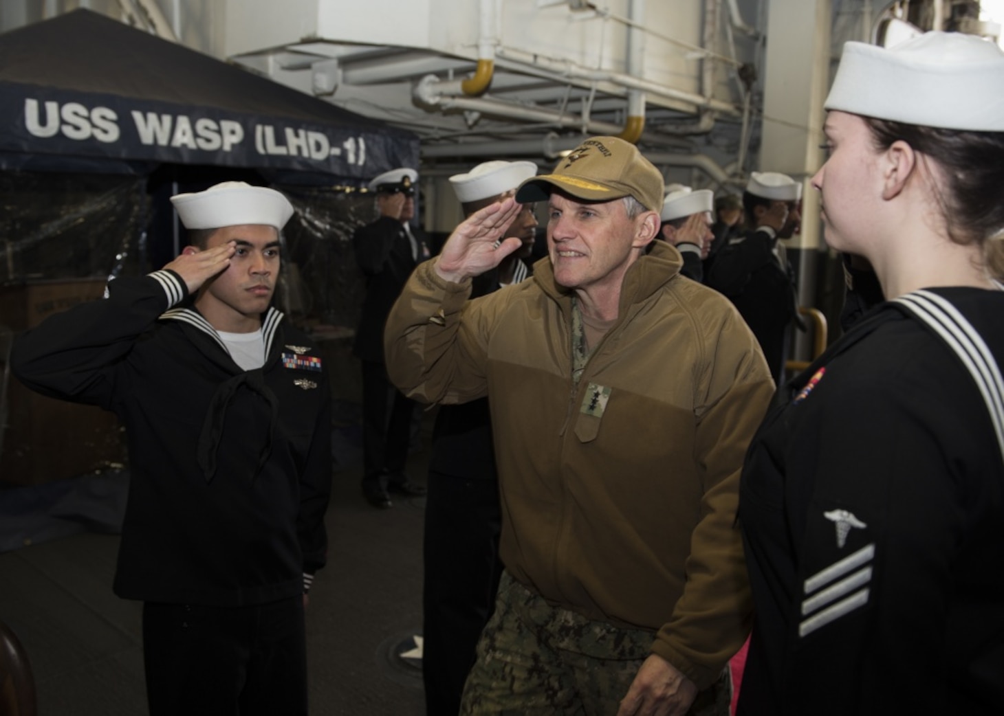 SASEBO, Japan (Jan. 9, 2018) Vice Adm. Phil Sawyer, commander of U.S. 7th Fleet, visits the crew of the amphibious assault ship USS Wasp (LHD 1) during a waterfront visit to forward deployed naval forces operating out of Fleet Activities Sasebo, Japan. Sawyer made the visit to Sasebo to thank the crews for their hard work as well as hear directly from the crews operating in the 7th Fleet.