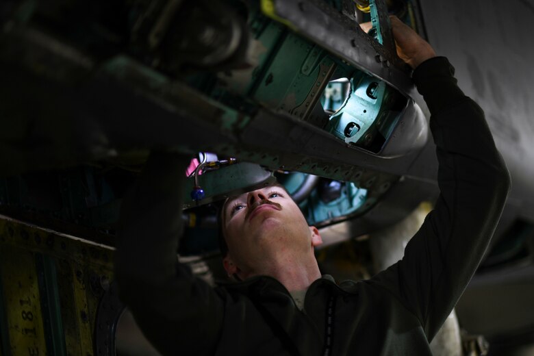A 48th Maintenance Group maintainer inspects an F-15E Strike Eagle during a phase inspection at Royal Air Force Lakenheath, England, Jan. 10, 2019. The nine-day-long inspection is conducted by Airmen from several squadrons within the 48th MXG. (U.S. Air Force photo by Senior Airman Malcolm Mayfield)