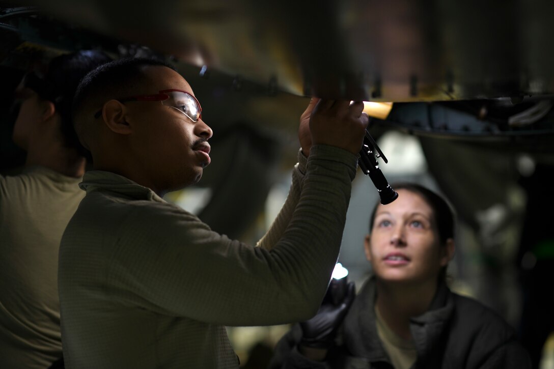 48th Maintenance Group maintainers work on an F-15E Strike Eagle during a phase inspection at Royal Air Force Lakenheath, England, Jan. 10, 2019. The aircraft is completely broken down while each component is examined and then rebuilt after any issues have been repaired. (U.S. Air Force photo by Senior Airman Malcolm Mayfield)