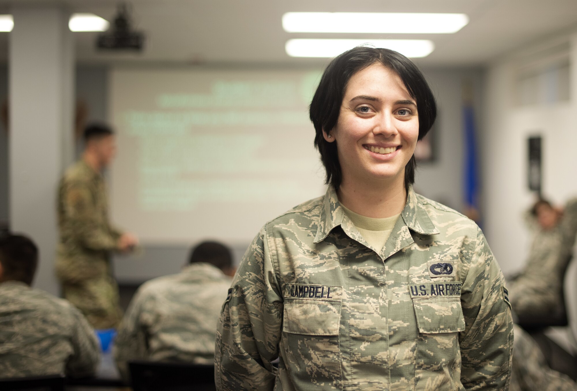 Airman 1st Class Elizabeth Campbell, 60th Aerial Port Squadron air transportation apprentice, poses for a photo Jan. 8, 2019, at Travis Air Force Base, Calif. Campbell was appointed the class leader position for First Term Airman Course which is designed to help transition Airmen from the technical training atmosphere to the operational Air Force. (U.S. Air Force photo by Airman 1st Class Jonathon Carnell)