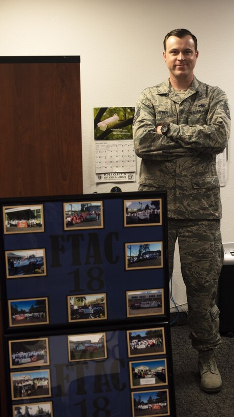 U.S. Air Force Tech. Sgt. Nathaniel Hyder, 821st Contingency Response Support Squadron equipment technician, poses for a photo Jan. 8, 2019, at Travis Air Force Base, Calif. Hyder is the First Term Airman Course team lead where he oversees Airmen who are transitioning from the technical training atmosphere to the operational Air Force. (U.S. Air Force photo by Airman 1st Class Jonathon Carnell)