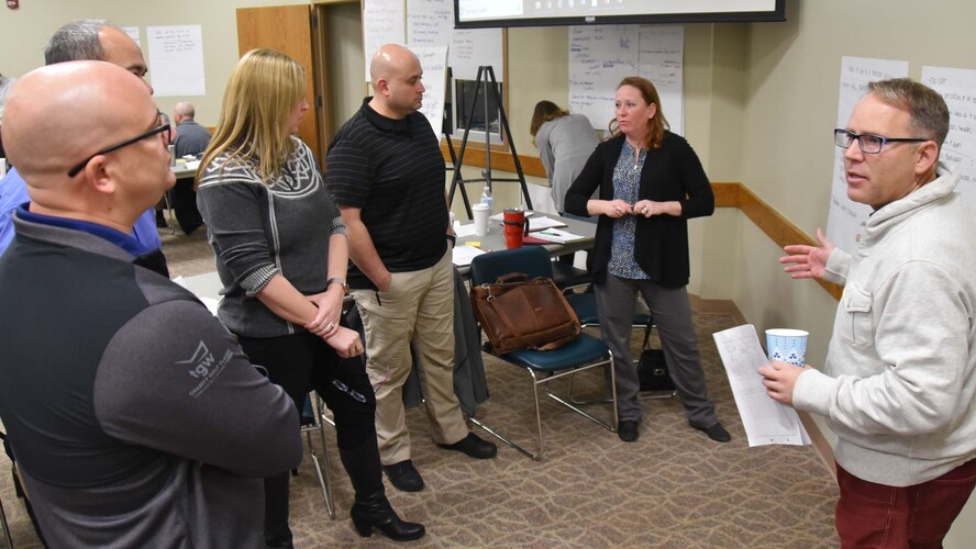 Leadership from the 931st Air Refueling Wing perform an exercise during a leadership course at the Derby Chamber of Commerce Jan. 10, 2019.