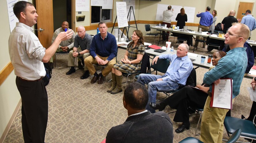 Leadership from the 931st Air Refueling Wing perform an exercise during a leadership course at the Derby Chamber of Commerce Jan. 10, 2019.