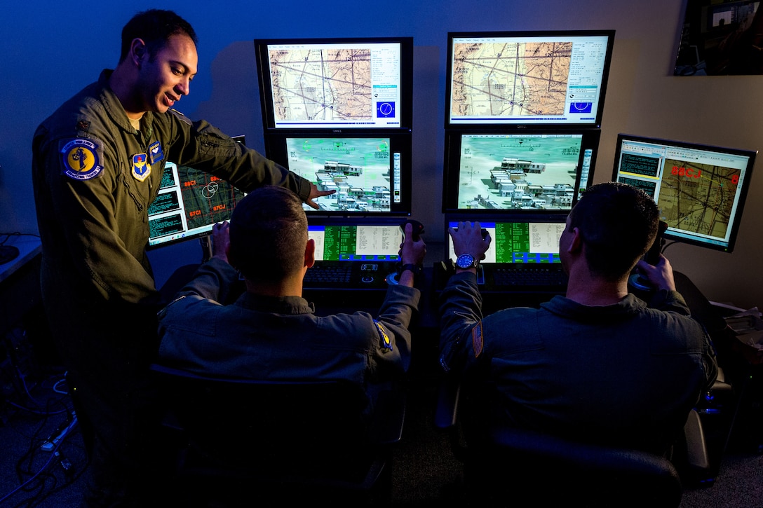 Air Force major trains enlisted pilot students.