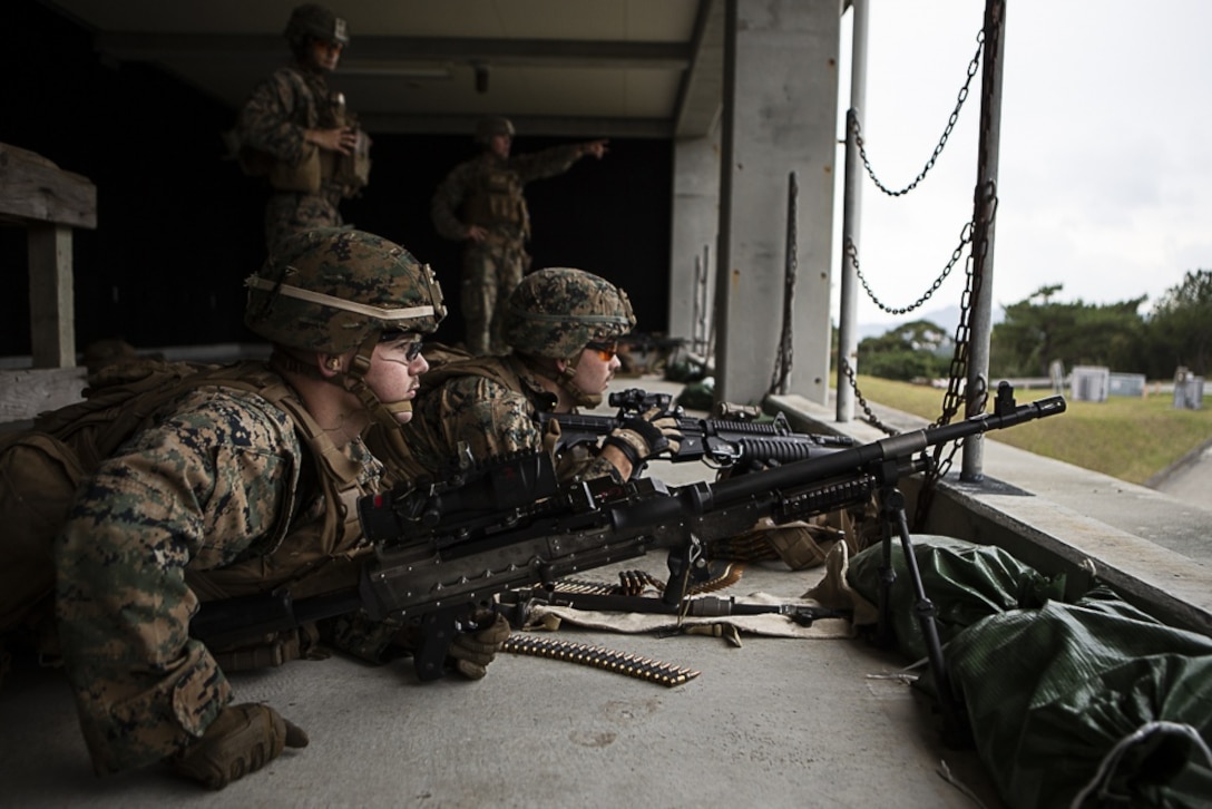 A M240B medium machine gun team with Charlie Company, Battalion Landing Team, 1st Battalion, 4th Marines, identifies targets during training at Camp Hansen, Okinawa, Japan, Jan. 9, 2019. Machine gunners and designated marksmen with Charlie Company fired more than 13,000 rounds during the training, refining their abilities with the M240B medium machine gun and M38 designated marksman rifle as part of BLT 1/4, the Ground Combat Element for the 31st Marine Expeditionary Unit. The 31st MEU, the Marine Corps’ only continuously forward-deployed MEU, provides a flexible and lethal force ready to perform a wide range of military operations as the premier crisis response force in the Indo-Pacific region. (U.S. Marine Corps photo by Gunnery Sgt. T. T. Parish/Released)