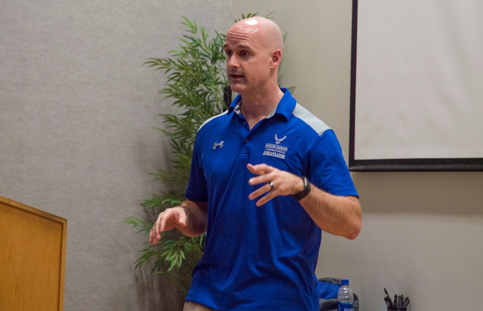 Chief Master Sgt. Neil Jones, Air Force Explosive Ordnance Disposal operational training and exercise program manager assigned to Tyndall Air Force Base, speaks to members of the 15th Wing about resiliency during an Air Force Wounded Warrior CARE ambassador briefing at Joint Base Pearl Harbor-Hickam, Hawaii, Jan. 9, 2018. Throughout the week, the Warrior CARE events integrated all support programs into one platform to strengthen mental, physical, spiritual and social well-being of enrolled Wounded Warriors and their caregivers, while helping others by sharing their stories of resiliency. (U.S. Air Force photo by Tech. Sgt. Heather Redman)