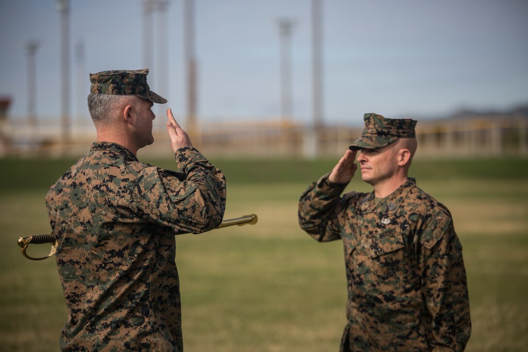 Sgt. Maj. Bryan M. Alfaro, the incoming sergeant major of Combat Logistics Battalion 31, salutes Lt. Col. Christopher Johnson, the battalion’s commander, during a Relief and Appointment ceremony at Camp Hansen, Okinawa, Japan, Jan. 10, 2019. During the ceremony, Alfaro assumed the sword of office from Sgt. Maj. Christopher Gasser. CLB-31 is the Logistics Combat Element for the 31st Marine Expeditionary Unit. The 31st MEU, the Marine Corps’ only continuously forward-deployed MEU, provides a flexible force ready to perform a wide range of military operations as the premier crisis response force in the Indo-Pacific Region. (U.S. Marine Corps photo by Lance Cpl. Kyle P. Bunyi/ Released)
