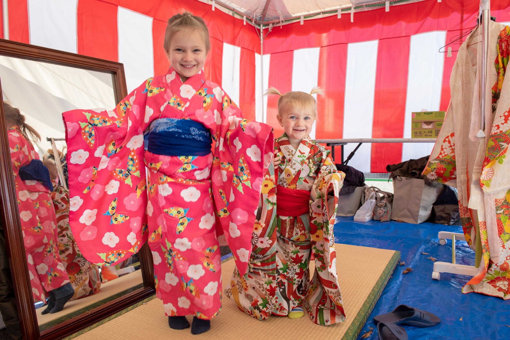 Children smile for the camera while wearing kimonos at Japanese Culture Day at Yokota Air Base, Japan, Jan. 11, 2019.