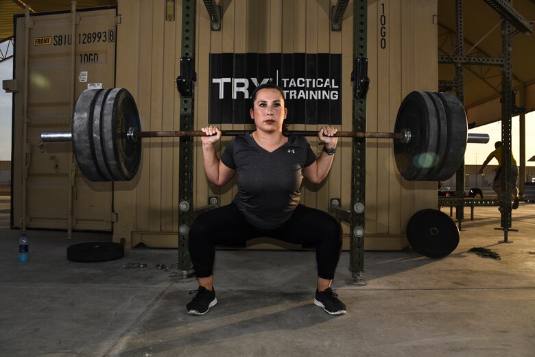 U.S. Air Force Master Sgt. Megan Bender, 727th Expeditionary Air Control Squadron weapons director, poses for a photo at Al Dhafra Air Base United Arab Emirates, Jan. 8, 2019. Bender is one of the three Airmen from ADAB that advanced to and placed in the Strongest in the AOR competition. (U.S. Air Force photo by Senior Airman Mya M. Crosby)