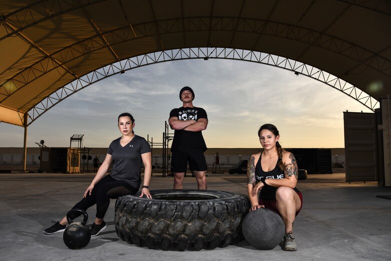 (From left to right) U.S. Air Force Master Sgt. Megan Bender, 727th Expeditionary Air Control Squadron weapons director; Staff Sgt. Nathaniel Roark, 380th Expeditionary Civil Engineer Squadron firefighter; and Staff Sgt. Janet Soto, 380th Expeditionary Logistics Readiness Squadron container control officer, pose for a photo at Al Dhafra Air Base United Arab Emirates, Jan. 8, 2019. The Airmen competed against 143 others from bases such as Bagram Airfield, Afghanistan, and Ali Al Salem Air Base, Kuwait, in the Strongest in the AOR competition. (U.S. Air Force photo by Senior Airman Mya M. Crosby)