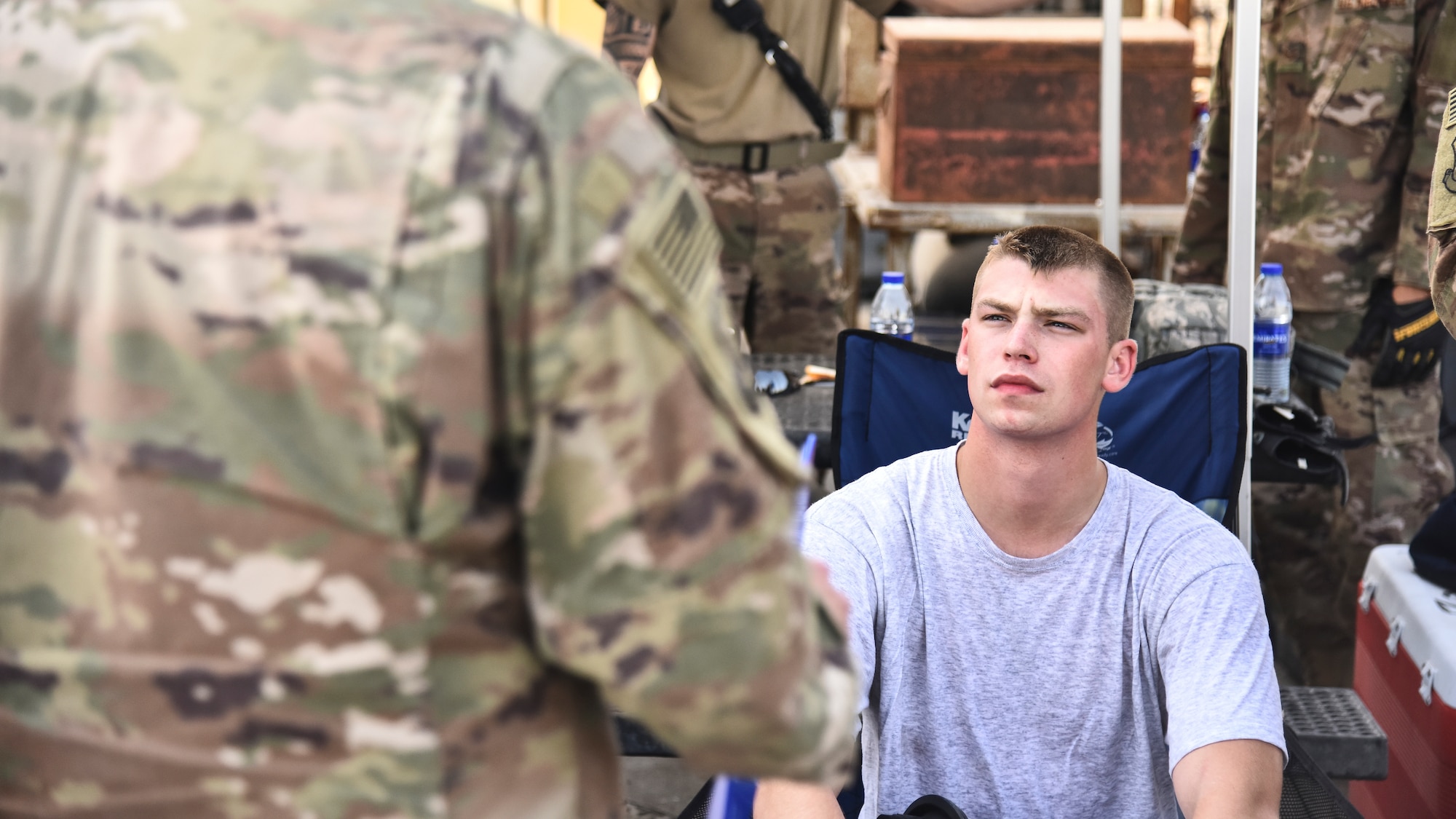 U.S. Air Force Senior Airman Brandon Freiburger, 380th Expeditionary Civil Engineer Squadron Fire Department firefighter, attends a critical incident stress debrief during a hazardous materials exercise at Al Dhafra Air Base, United Arab Emirates, Jan. 4, 2019. The 380th ECES Fire Department and Emergency Management flights conducted a joint-agency hazardous material exercise for training purposes. (U.S. Air Force photo by Senior Airman Mya M. Crosby)