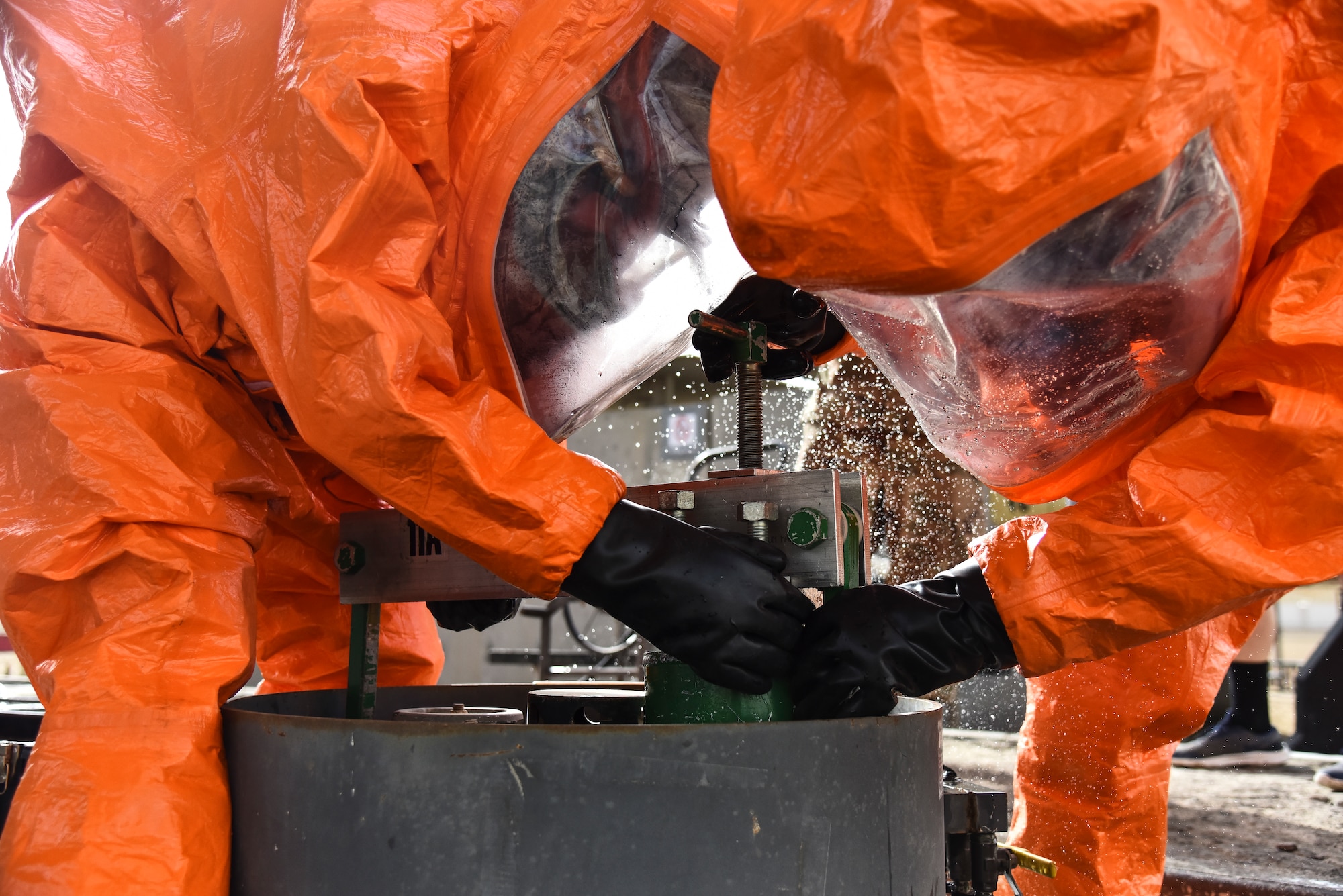 U.S. Airmen assigned to the 380th Expeditionary Civil Engineer Squadron Fire Department flight use a C-Kit to cap a leaking gate valve of a rail car prop during a hazardous materials exercise at Al Dhafra Air Base, United Arab Emirates, Jan. 4, 2019. The 380th ECES Fire Department and Emergency Management flights conducted a joint-agency hazardous material exercise for training purposes. (U.S. Air Force photo by Senior Airman Mya M. Crosby)