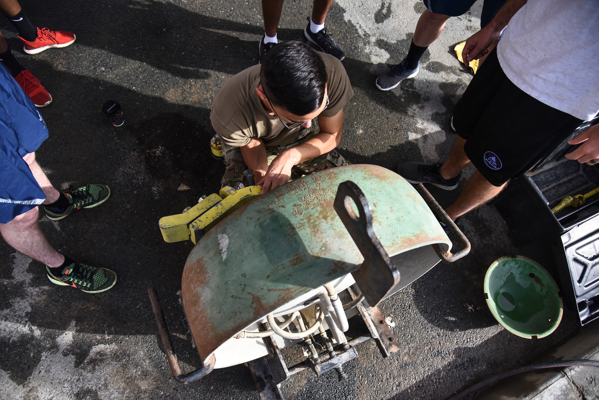 U.S. Air Force Senior Airman Adam Theriault, 380th Expeditionary Security Forces Squadron force protection emergency manager, trains on a one-ton cryo-tank during a hazardous materials exercise at Al Dhafra Air Base, United Arab Emirates, Jan. 4, 2019. The exercise was designed to be a Department of Defense certification for three Airmen in the Fire Department and an annual refresher training for the Emergency Management flight. The Airmen were instructed to contain leaks on a pressurized chlorine cylinder, a one-ton cryo-tank, and a rail car, all after donning a Level-A suit. (U.S. Air Force photo by Senior Airman Mya M. Crosby)