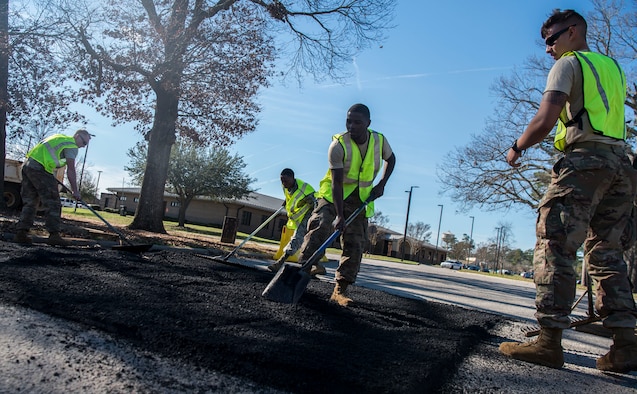 U. S. Air Force Airmen with the 20th Civil Engineer Squadron, also known as the Dirt Boyz, spread pavement evenly at Shaw Air Force Base, S.C., Jan. 8, 2019.