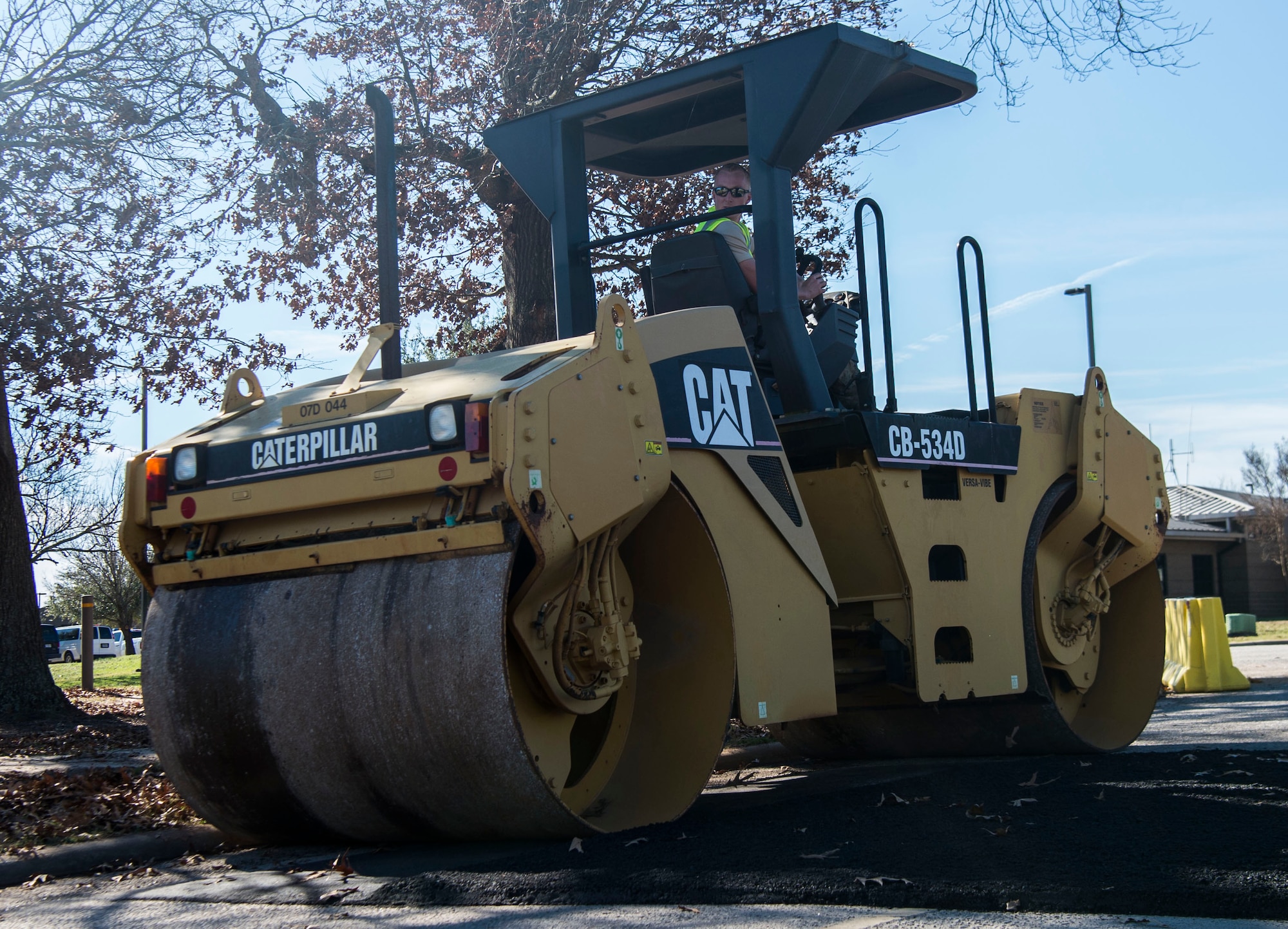 U.S. Air Force Staff Sgt. Chance Cunningham, 20th Civil Engineer Squadron pavement and construction equipment craftsman, uses a road roller to compact pavement at Shaw Air Force Base, S.C., Jan. 8, 2019.