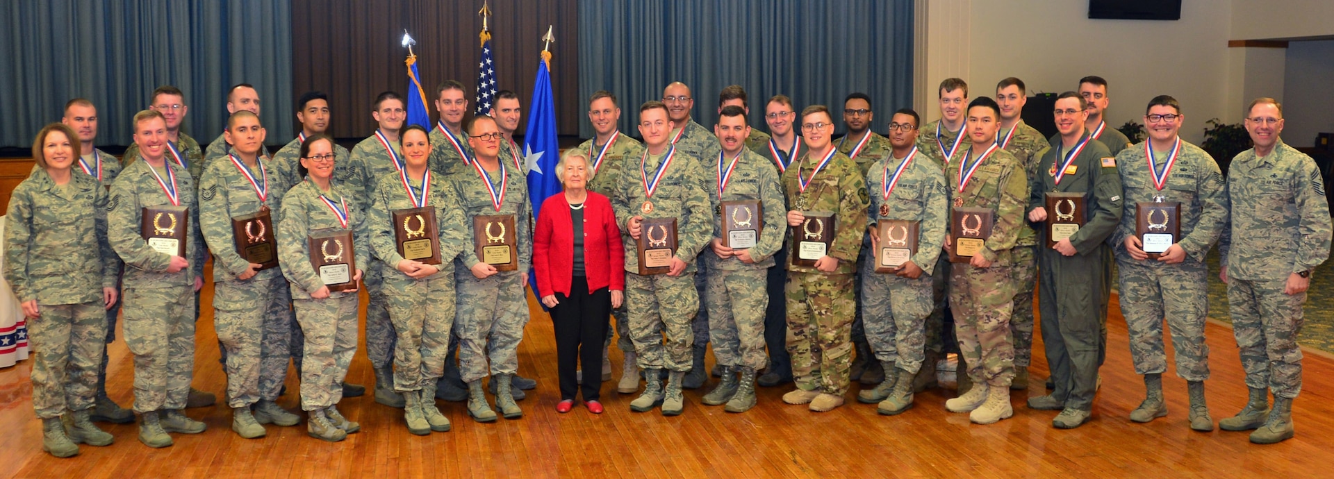 The widow of Maj. Gen. Doyle E. Larson (center) joins the recognition of Twenty-Fifth Air Force’s Maj. Gen. Doyle E. Larson Awards finalists. Maj. Gen. Mary O’Brien, Twenty-Fifth Air Force commander, and Chief Master Sgt. Stanley Cadell, Twenty-Fifth Air Force command chief presented the awards at Joint Base San Antonio-Lackland, Texas, Dec. 6, 2018.