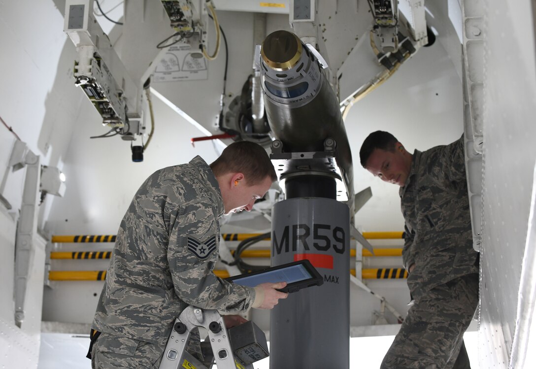 Staff Sgt. Cordel Shields, a 34th Aircraft Maintenance Unit load crew member, goes over his checklist after loading an inert GBU-38 Joint Direct Attack Munition onto a simulated B-1 bomber at the annual weapons load competition at Ellsworth Air Force Base, S.D., Jan. 7, 2019. During the competition, load crew teams were given 40 minutes to install two inert GBU-38 JDAMs and one inert AGM-158 Joint Air-to-Surface Standoff Missile onto a simulated B-1 bomber. (U.S. Air Force photo by Airman 1st Class Christina Bennett)