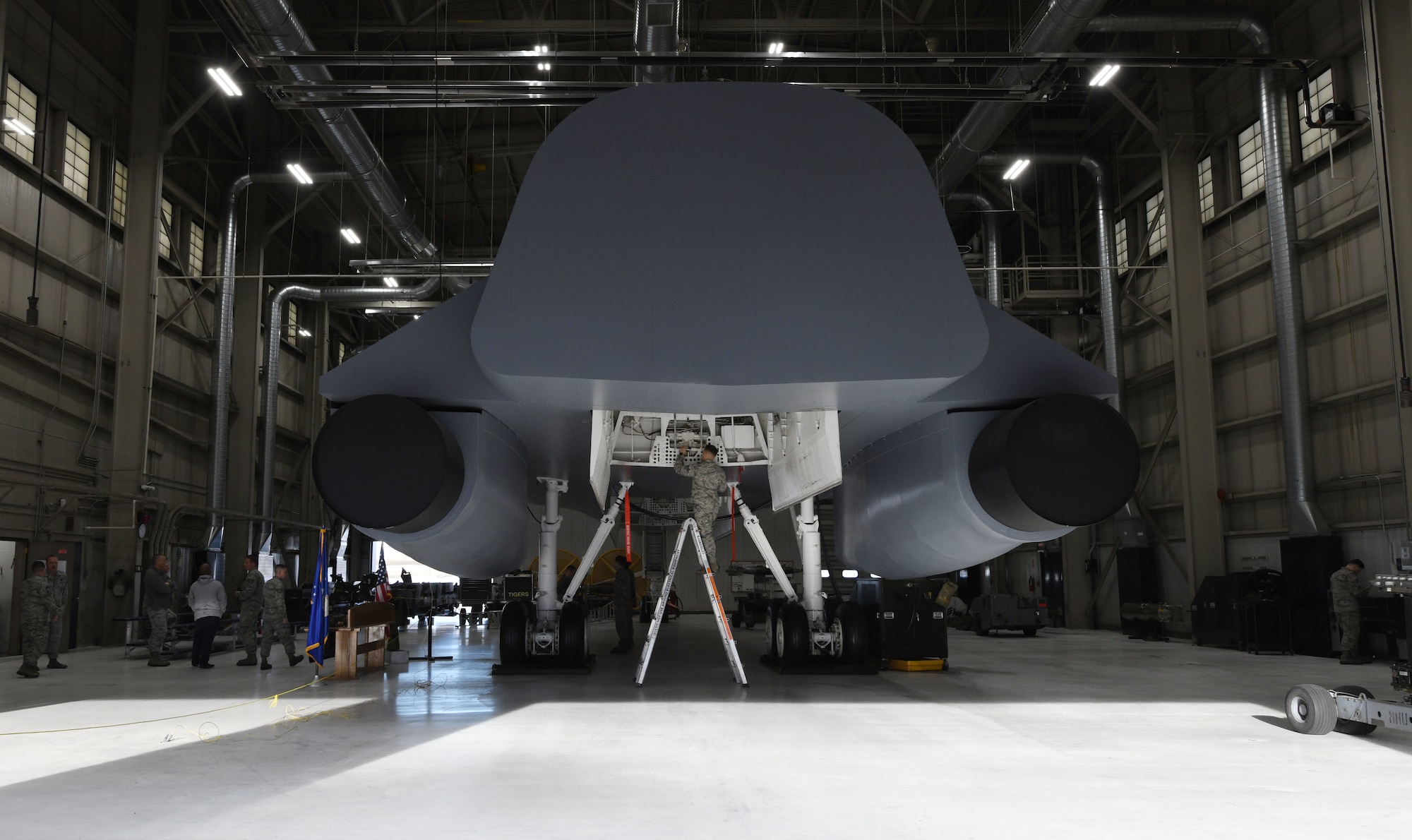 Weapon loaders from the 28th Munitions Squadron, the 34th Aircraft Maintenance Unit and the 37th Aircraft Maintenance Unit compete in an annual weapons loading competition at Ellsworth Air Force Base, S.D., Jan. 7, 2019. Each team was given 40 minutes to load two inert GBU-38 Joint Direct Attack Munitions and one inert AGM-158 Joint Air-to-Surface Standoff Missile onto a simulated B-1 bomber. (U.S. Air Force photo by Airman 1st Class Christina Bennett)