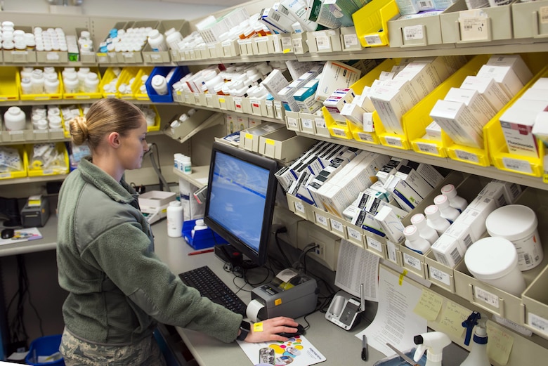A 55th Medical Group pharmacist processes medication in the Ehrling Burquist pharmacy Jan. 7, 2019, Offutt Air Force Base, Nebraska. The base pharmacy carefully screens all medications to ensure quality controlled products are correctly supplied to their patients. (U.S. Air Force photo by Zachary Hada)