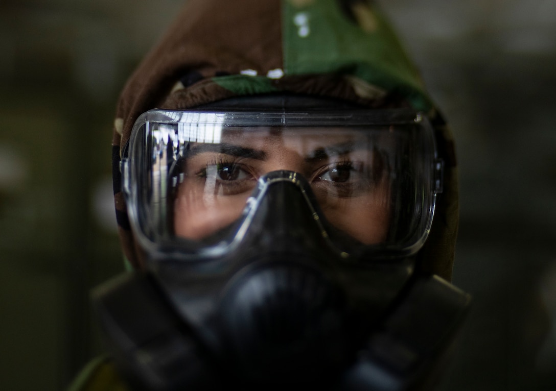 Senior Airman Eusaybia Parker wears her M50 gas mask