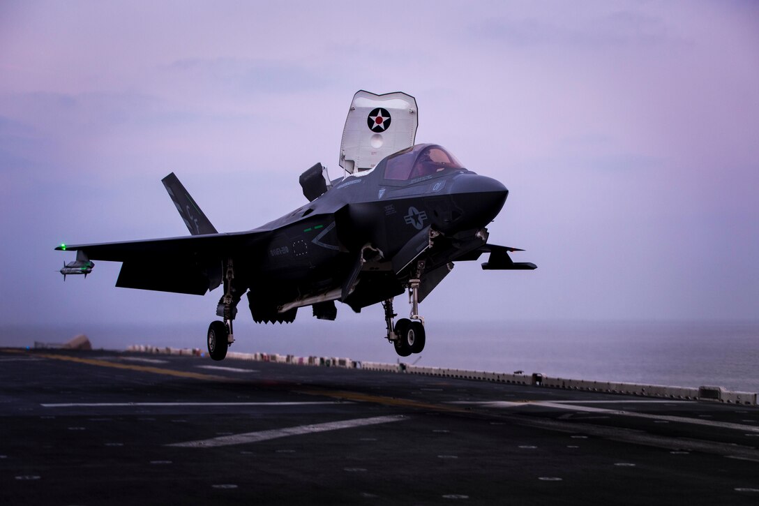 ARABIAN SEA – An F-35B Lightning II assigned to Marine Fighter Attack Squadron 211 (VMFA), 13th Marine Expeditionary Unit (MEU), makes final preparations to land aboard the Wasp-class amphibious assault ship USS Essex (LHD 2), Jan. 9, 2019. The Essex is the flagship for the Essex Amphibious Ready Group and, with the embarked 13th MEU, is deployed to the U.S. 5th Fleet area of operations in support of naval operations to ensure maritime stability and security in the Central Region, connecting the Mediterranean and the Pacific through the western Indian Ocean and three strategic choke points. (U.S. Marine Corps photo by Cpl. A. J. Van Fredenberg/Released)
