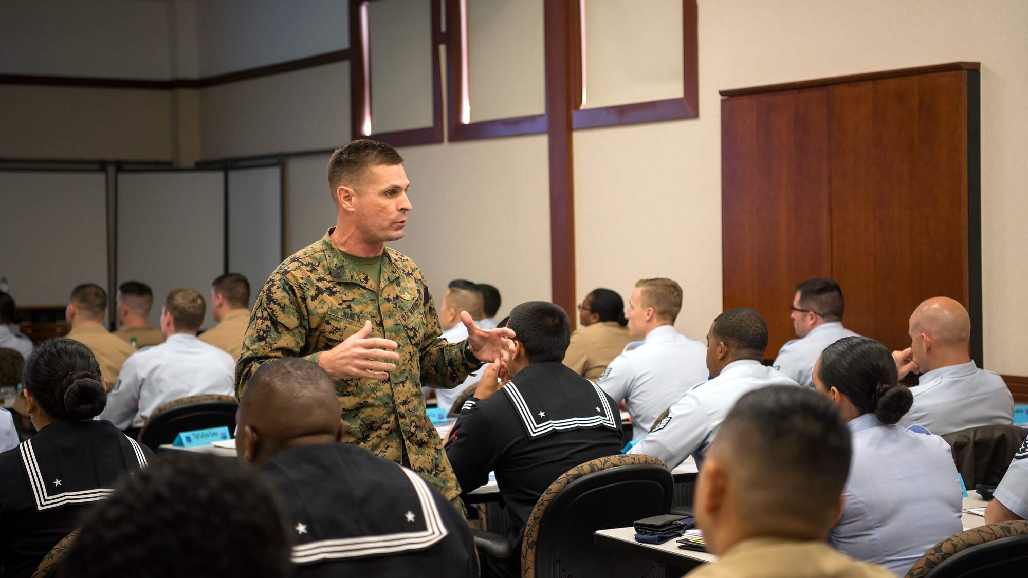 U.S. Marine Corps Master Gunnery Sgt. Blaine Jones, the U.S. Central Command senior enlisted advisor to the joint operations section, speaks with students of the first-ever Joint Professional Military Education course at MacDill Air Force Base, Fla., January 8, 2019. The course covered topics such as the joint perspective of each branch, cultural and ethical awareness, building partnerships, communication, and leadership.